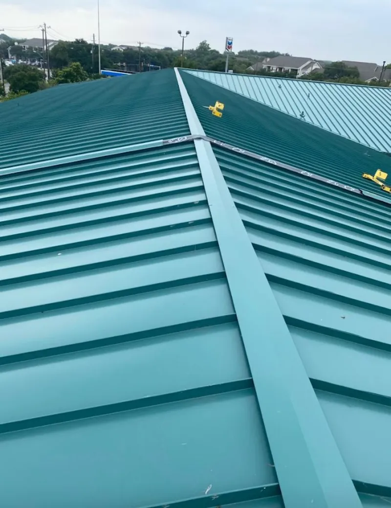 Green commercial metal roof ridge and valley for Metal Roof Repair in Martinsburg